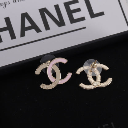 New two-tone logo engraved earrings